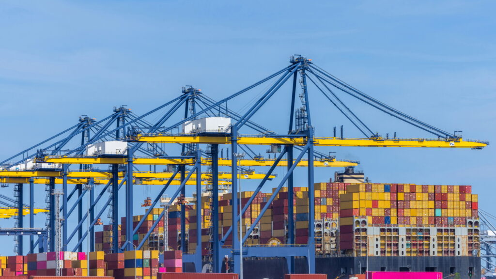 Container cargo ship at international industrial seaport, Global business logistic maritime