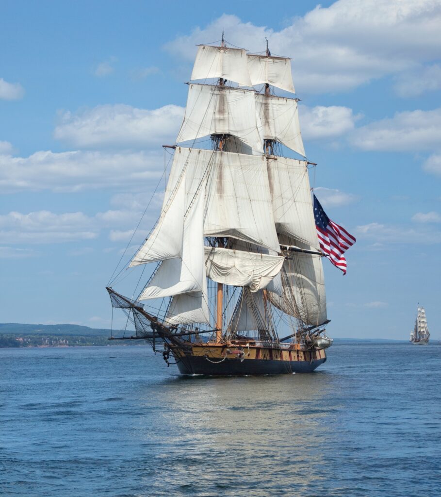 Tall Ship Sailing on Blue Waters